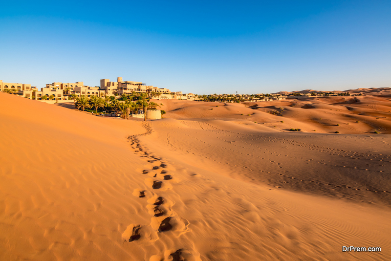 Footprints on desert sand in Abu Dhabi