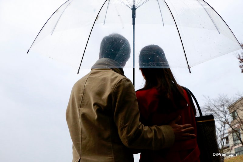 Japanese couple walking in the rain