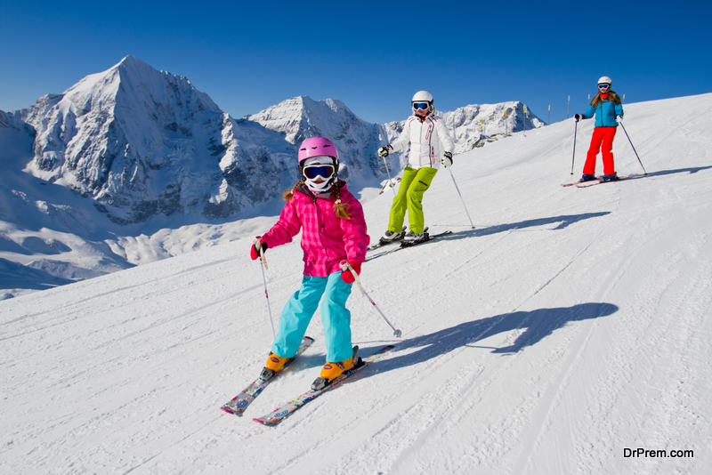 Skiing, winter, ski lesson - skiers on ski slope